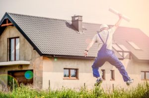 Contractor jumping with happines - one of the many bonus services movers should consider offering.