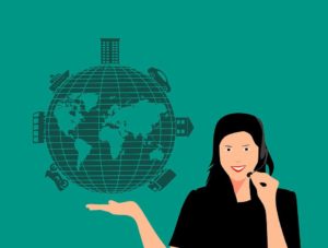 Woman holding the globe with transportation vehicles on it.