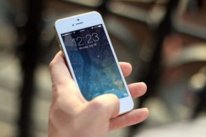 Person holding a smartphone.