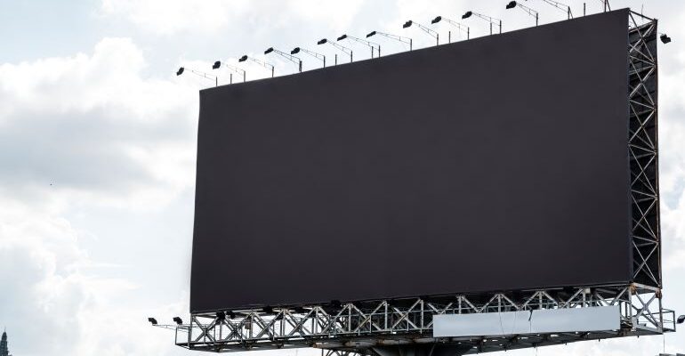A blank billboard as a medium you can use to advertise your moving business.