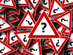 Lots of signs with question marks on them, symbolizing one of the more convenient email personalization techniques for beginners.