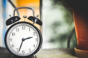 A clock on a table.