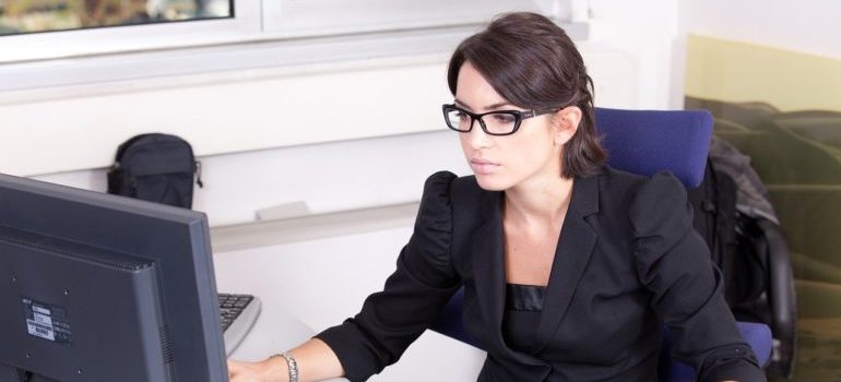 An accountant working on avoiding bookkeeping mistakes.