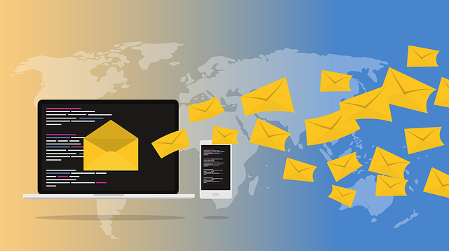 A drawing of a PC sending e-mails over the globe.
