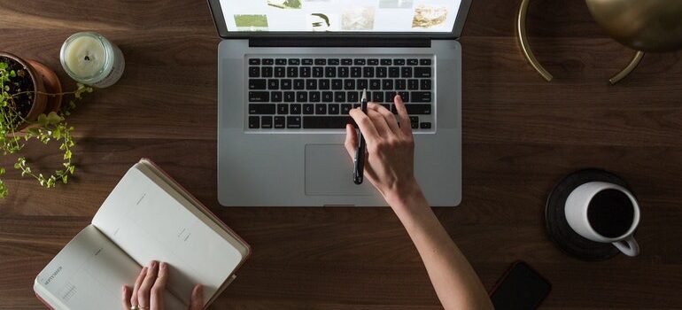 Person researching advantages of using website widgets.