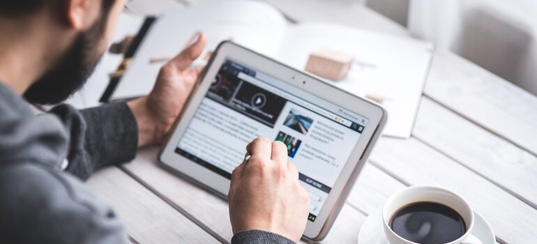 Person reading on a tablet.