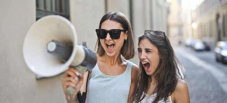 Person using a megaphone.