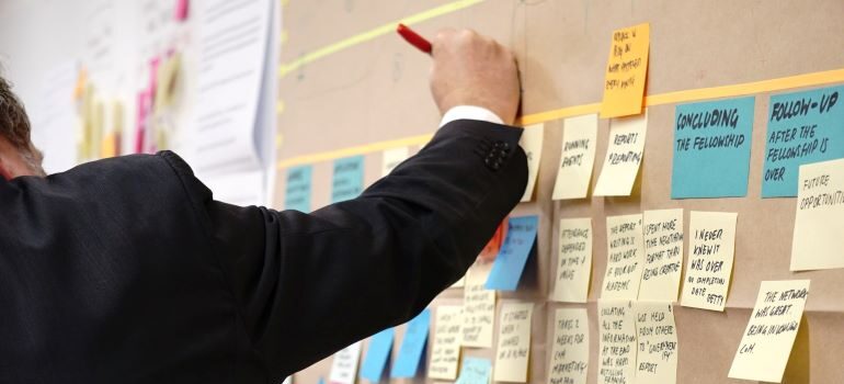 Sticky notes on a corkboard