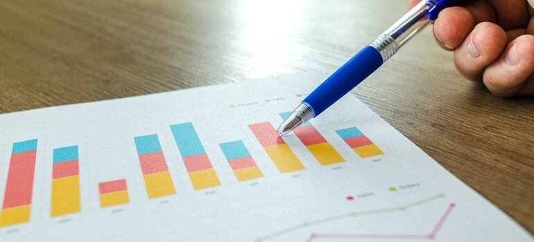 Person observing graphs.