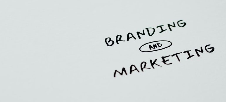 "Branding and marketing" written on white paper.